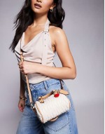 ruched mini bowler bag with charms in cream