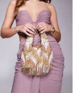 bead embellished tassle shoulder bag in pink and gold