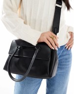 PASQ flap over grab bag with crossbody strap in black