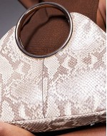 ring handle clutch bag in snake print