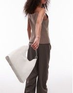 leather shoulder bag with metal detail handle in off white