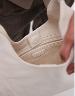 leather shoulder bag with metal detail handle in off white