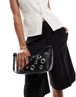 scoop shoulder bag with studded eyelets in black