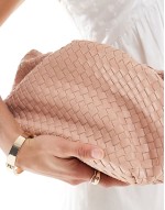woven clutch bag in beige
