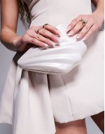 shell clutch bag in cream